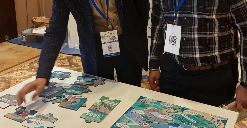 Attendees engaging with puzzles at the event.
